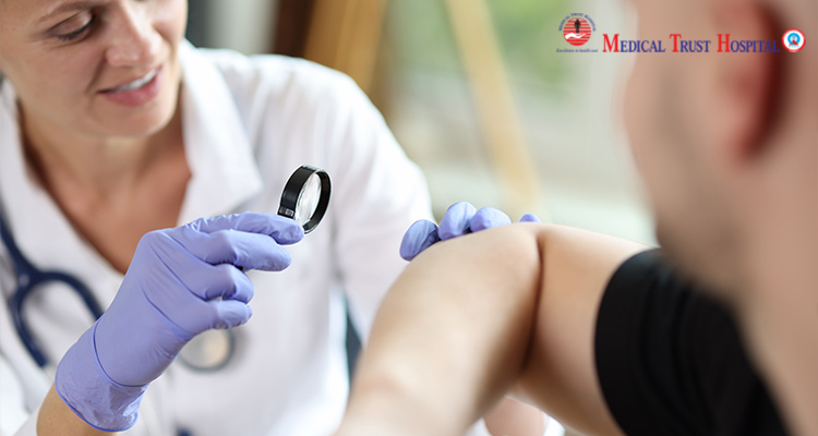 Dermatologist testing the skin of a patient